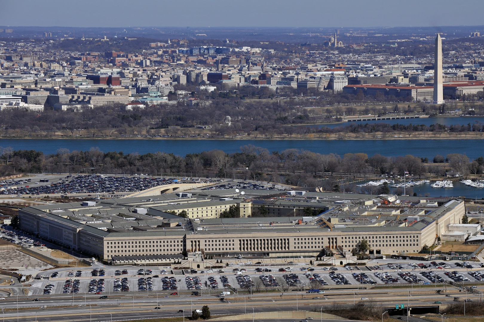 The Pentagon with the Washington Monument and National Mall in the background. Military personnel will have the opportunity to participate in a confidential survey.