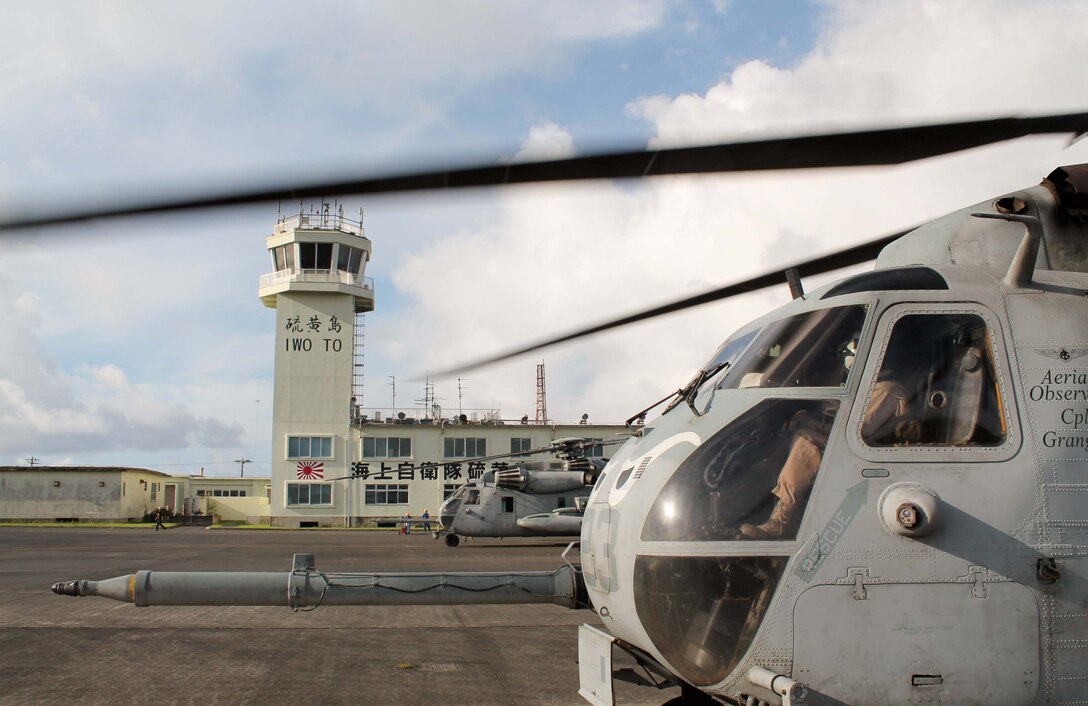 CH-53E Super Stallions from Marine Medium Tiltrotor Squadron 163 (Reinforced), 11th Marine Expeditionary Unit, sit at the air station at Iwo To, Japan, as part of the MEU’s WESTPAC 14-2 deployment in the 7th Fleet area of operations. The 11th MEU and Makin Island Amphibious Ready Group are deployed to the 7th Fleet area of operations as a sea-based, expeditionary crisis response force capable of conducting amphibious missions across the full range of military operations. (U.S. Marine Corps photo by Capt. Kenneth P. Mateo/RELEASED)
