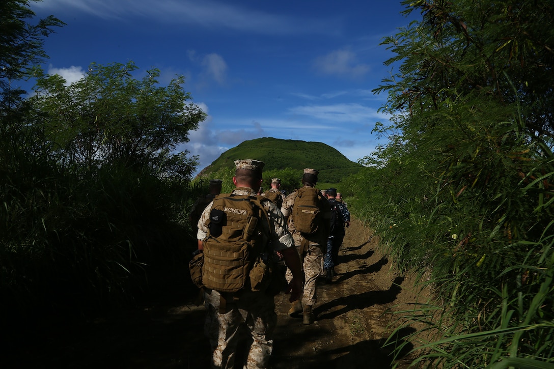 Marines and sailors with the 11th Marine Expeditionary Unit and  Amphibious Squadron Five hike to Mount Suribachi during their visit to Iwo To, Japan as part of the MEU’s WESTPAC 14-2 deployment Aug. 16, 2014. The 11th MEU and Makin Island Amphibious Ready Group are deployed to the U.S. 7th Fleet area of operations as a sea-based, expeditionary crisis response force capable of conducting amphibious missions across the full range of military operations.  (U.S. Marine Corps photo by Lance Cpl. Laura Raga /Released)