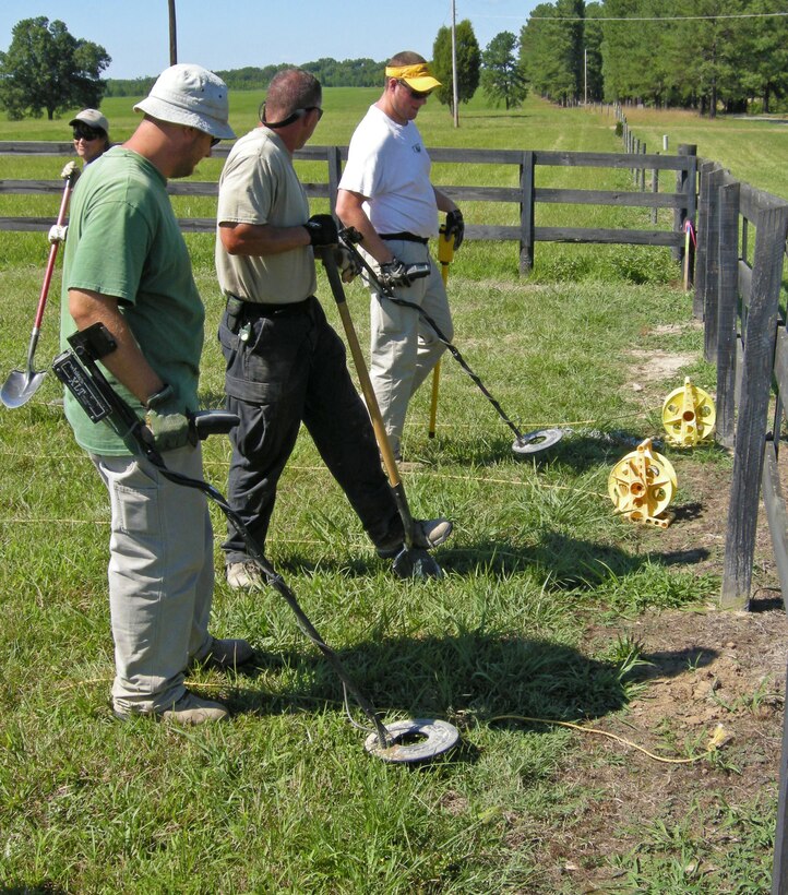 Contractors search for unexploded ordnance or UXO on private property near Butner, North Carolina. The Formerly Used Defense Site Camp Butner was a WWII infantry training installation located in a once-rural area 30 miles north of Raleigh. For more information about the FUDS program go to the following link;  http://www.usace.army.mil/Missions/Environmental/FormerlyUsedDefenseSites.aspx