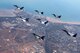 An F-16 Fighting Falcon aircraft from the D.C. Air National Guard performs an air-to-air formation with aircraft from the Royal Thai, United Arab Emirates, Republic of Singapore and Royal Australian air forces during Pitch Black 2014. The ANG unit is deployed to Australia from Kunsan Air Base, Republic of Korea. Pitch Black is the RAAF’s largest and most complex air exercise, traditionally held in the Northern Territory every two years. Exercise Pitch Black is being conducted from RAAF Bases Darwin and Tindal Aug. 1 through 22, 2014, featuring participants from Australia, the United States, New Zealand, Singapore, Thailand, United Arab Emirates and French Air Force (New Caledonia) who will cooperate for Offensive Counter Air (OCA) and Defensive Counter Air (DCA) missions. (Royal Australian Air Force photo by Cpl. David Gibbs/Released)