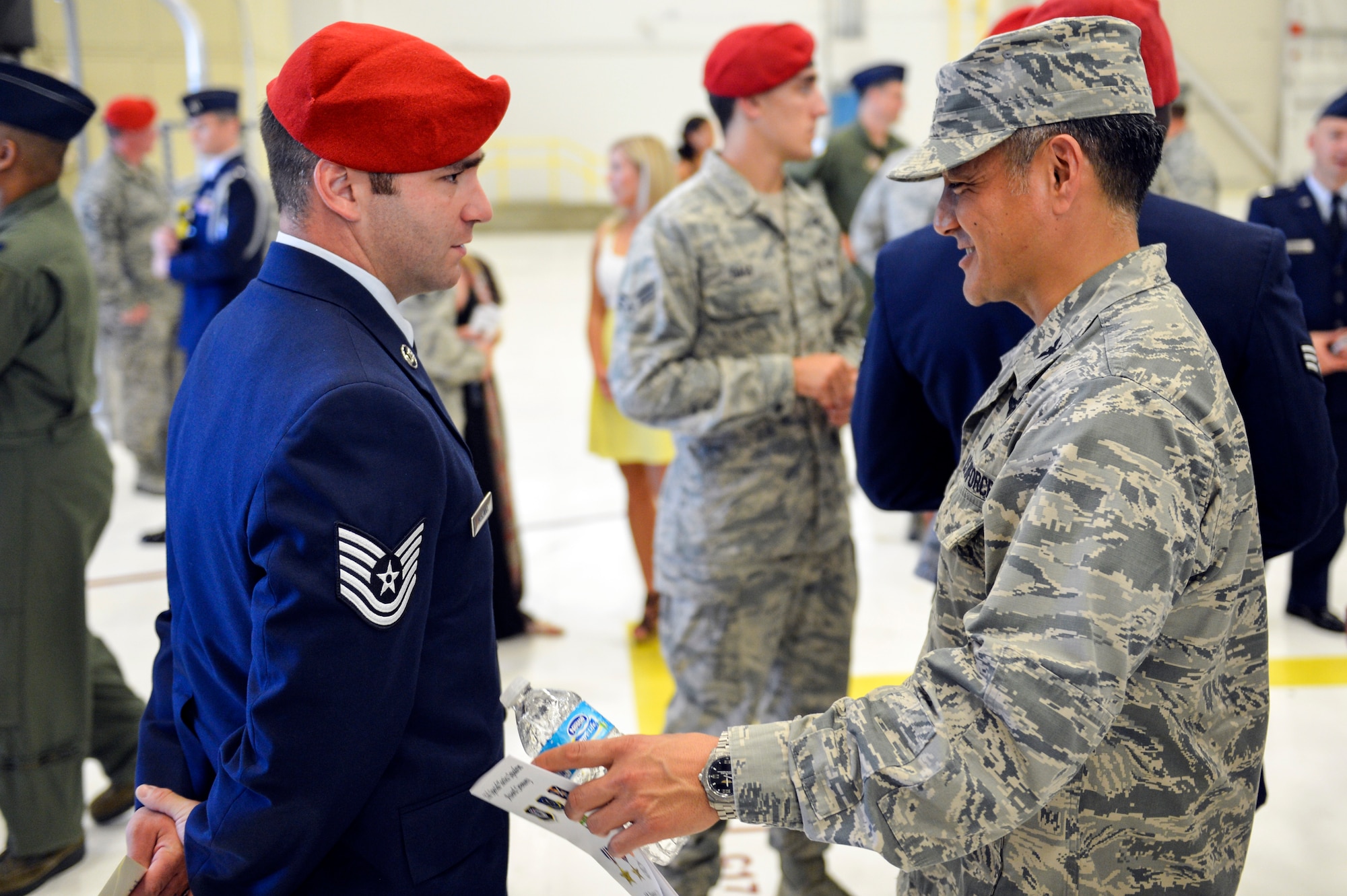 Col. David Kumashiro (right), 62nd Airlift Wing commander, thanks Tech. Sgt. Matthew McKenna, 22nd Special Tactics Squadron combat controller, for his service and actions in combat, which earned him the Silver Star, during the 22nd STS awards ceremony Aug. 18,2014, at Joint Base Lewis-McChord, Wash. McKenna is the 31st special tactics Airman to receive the medal since the 9/11 terrorist attacks. (U.S. Air Force photo/Staff Sgt. Russ Jackson)