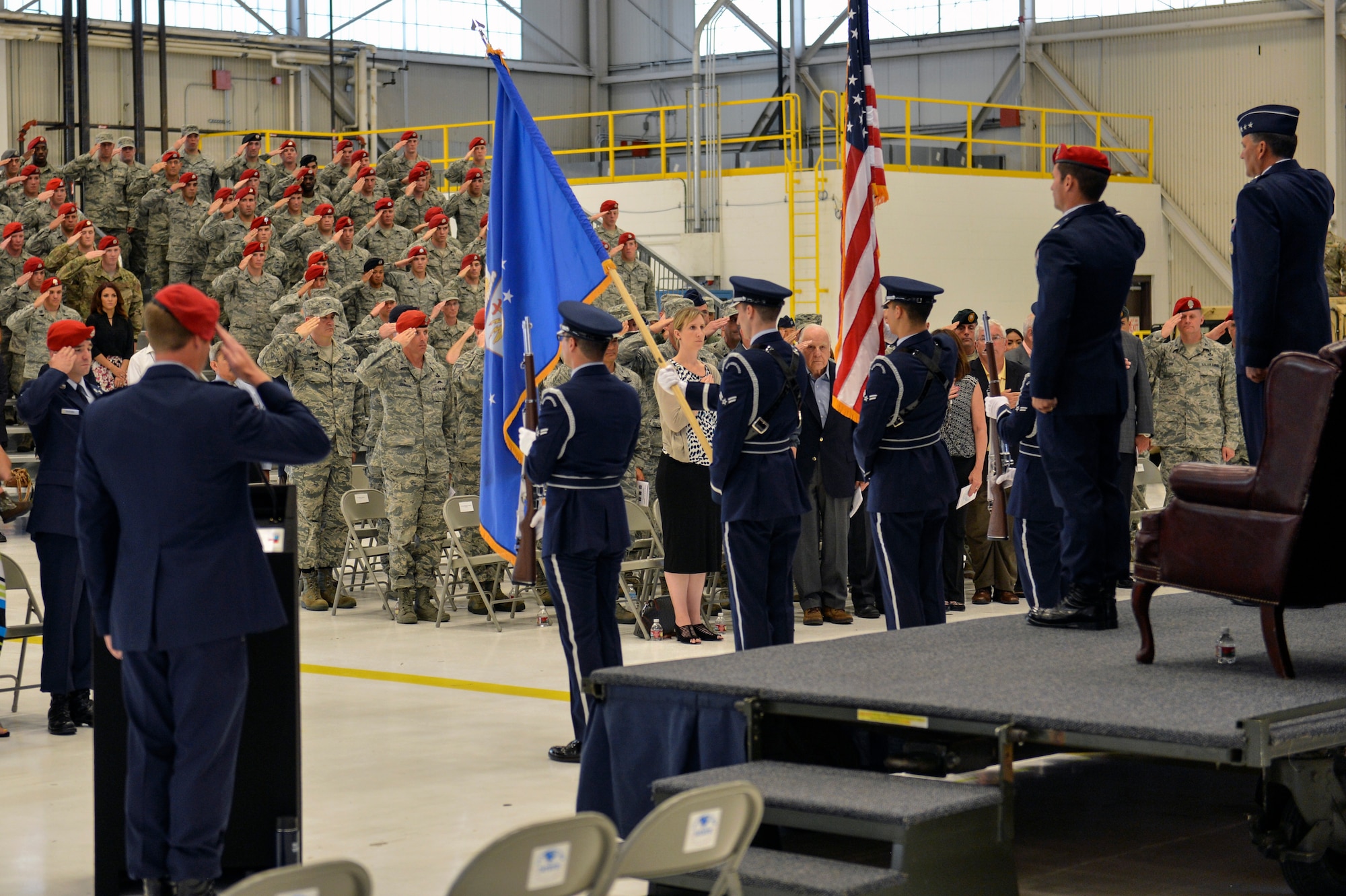 Members from the 22nd Special Tactics Squadron salute the presentation of the colors Aug. 18, 2014, during the 22nd STS awards ceremony at Joint Base Lewis-McChord, Wash. Airmen from the squadron and their families were accompanied by JBLM leadership and local community leaders to support their teammates being honored. (U.S. Air Force photo/Staff Sgt. Russ Jackson)