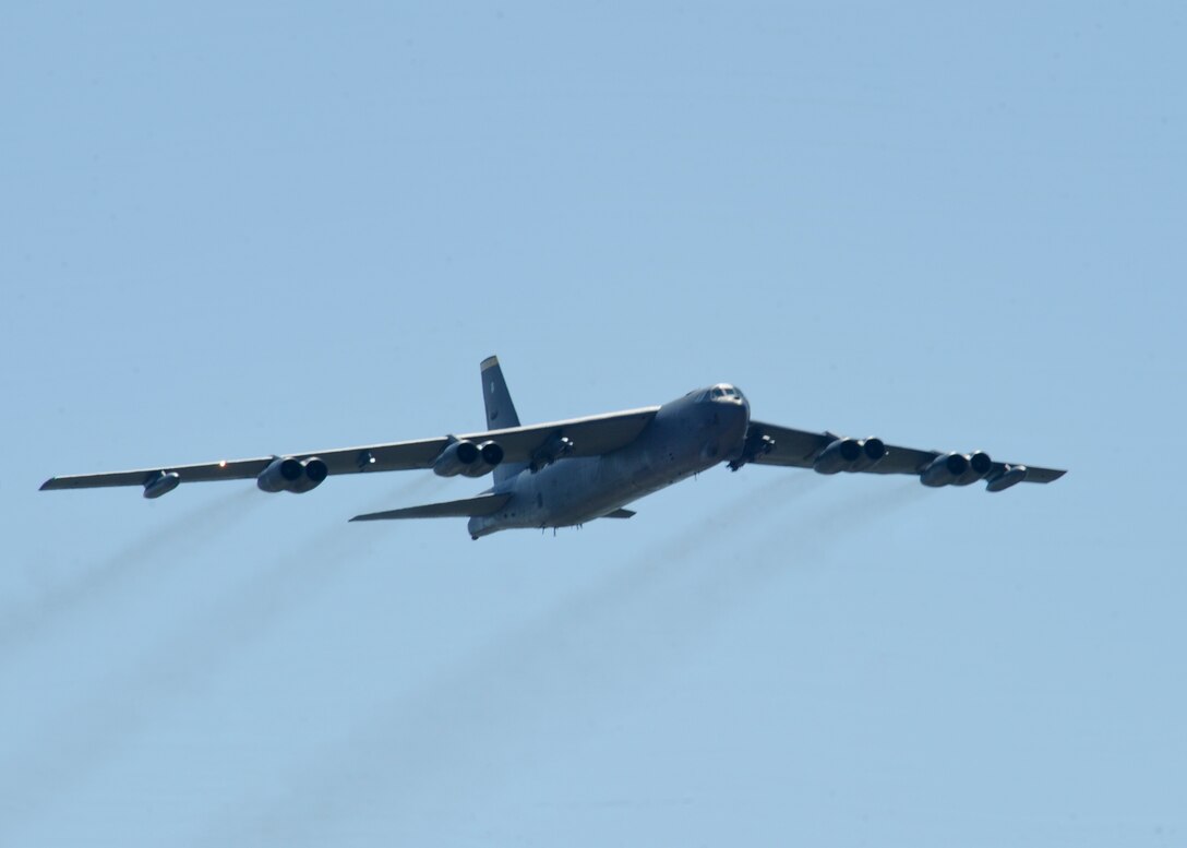 A B-52 Stratofortress conducts a flyby during Ellsworth’s Black Hills Community Appreciation Day at Ellsworth Air Force Base, S.D., Aug. 16, 2014. Airmen, their families and the local community were welcomed to the base for a day filled with aircraft and military vehicle static displays, a military working dog demonstration, and entertainment by Dogs Without Sweaters while providing opportunities to interact with base personnel and aircrew members to get a glimpse of the Air Force lifestyle. (U.S. Air Force photo by Senior Airman Anania Tekurio/Released)