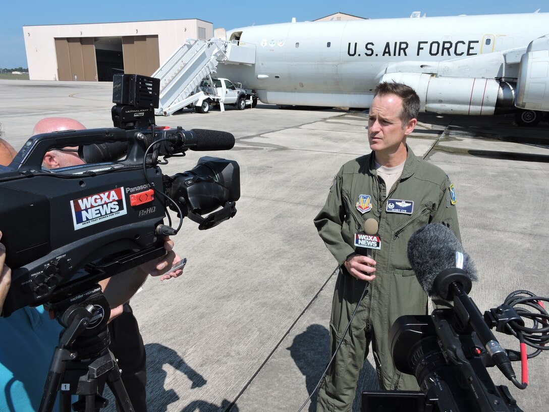 Col. Henry Cyr, 461st Air Control Wing commander, speaks to local reporters Monday during Air Force Industry Day as part of an effort to eventually replace the aging Joint STARS fleet and to enhance the plane’s capabilities. The event was hosted by the 461st and 116th Air Control wings. (U.S. Air Force photo by Roland Leach)