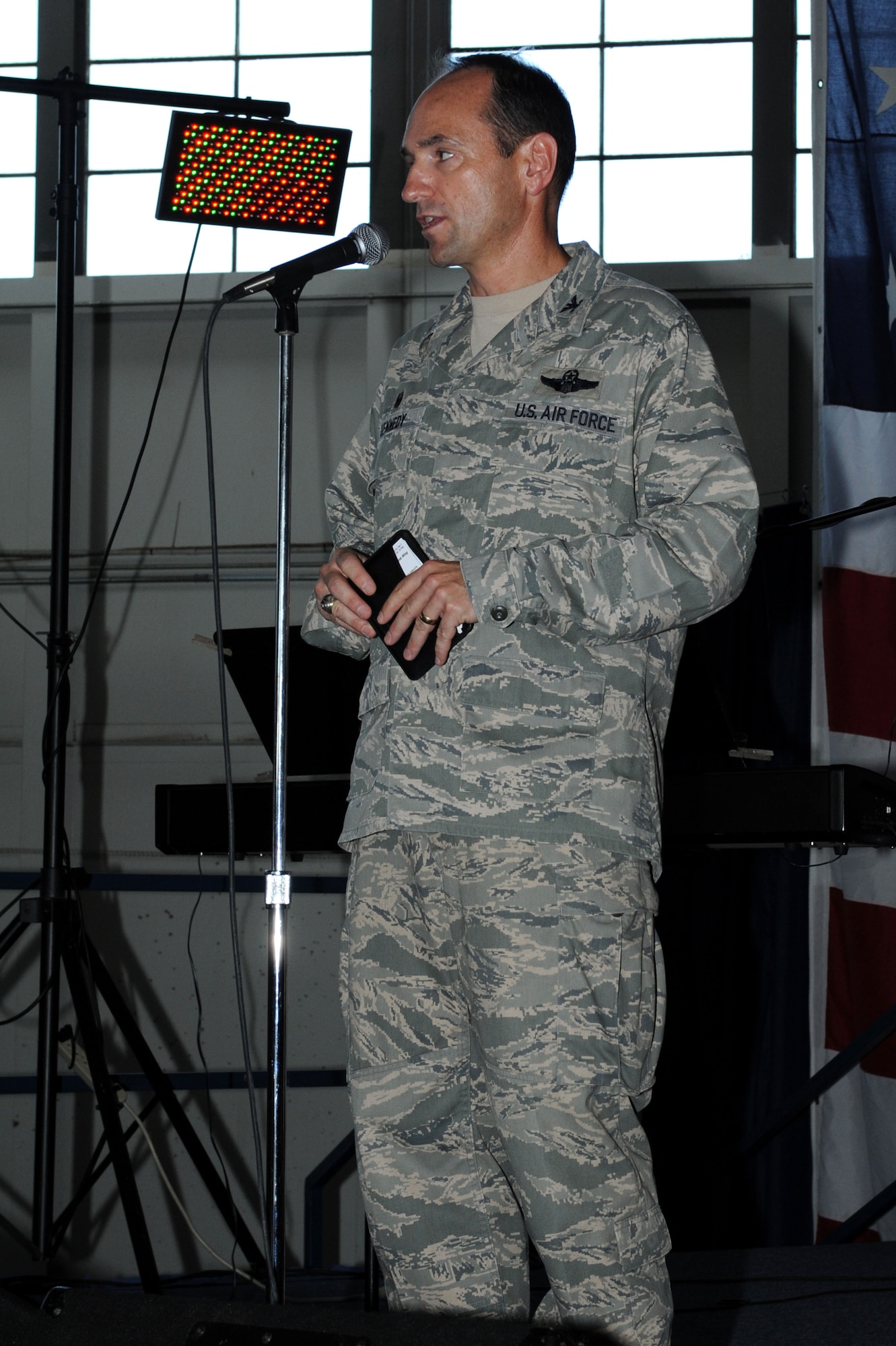 Col. Kevin Kennedy, 28th Bomb Wing commander, provides opening remarks during the Black Hills Community Appreciation Day at Ellsworth Air Force Base, S.D., Aug. 16, 2014. During the event, community members experienced a B-1 bomber and B-52 Stratofortress flyby, a B-1 high-speed pass, various aircraft and vehicle static displays, and a performance by local band, Dogs Without Sweaters. (U.S. Air Force photo by Senior Airman Hailey R. Staker)