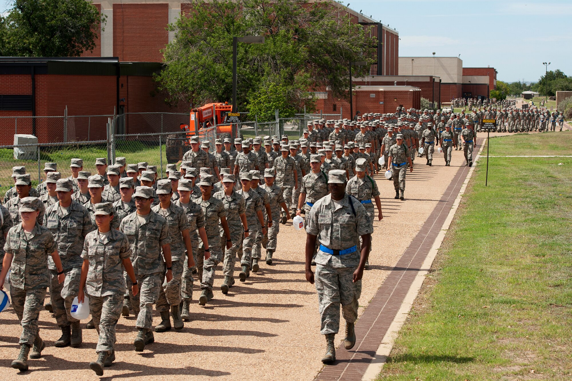GOODFELLOW AIR FORCE BASE, Texas – The 315th Training Squadron marches down the troop walk at the end of the academic day July 7. The 315th TRS has over 220 instructors training more than 4,800 students annually for global intelligence, surveillance and reconnaissance missions. (U.S. Air Force photo/ Airman 1st Class Devin Boyer)