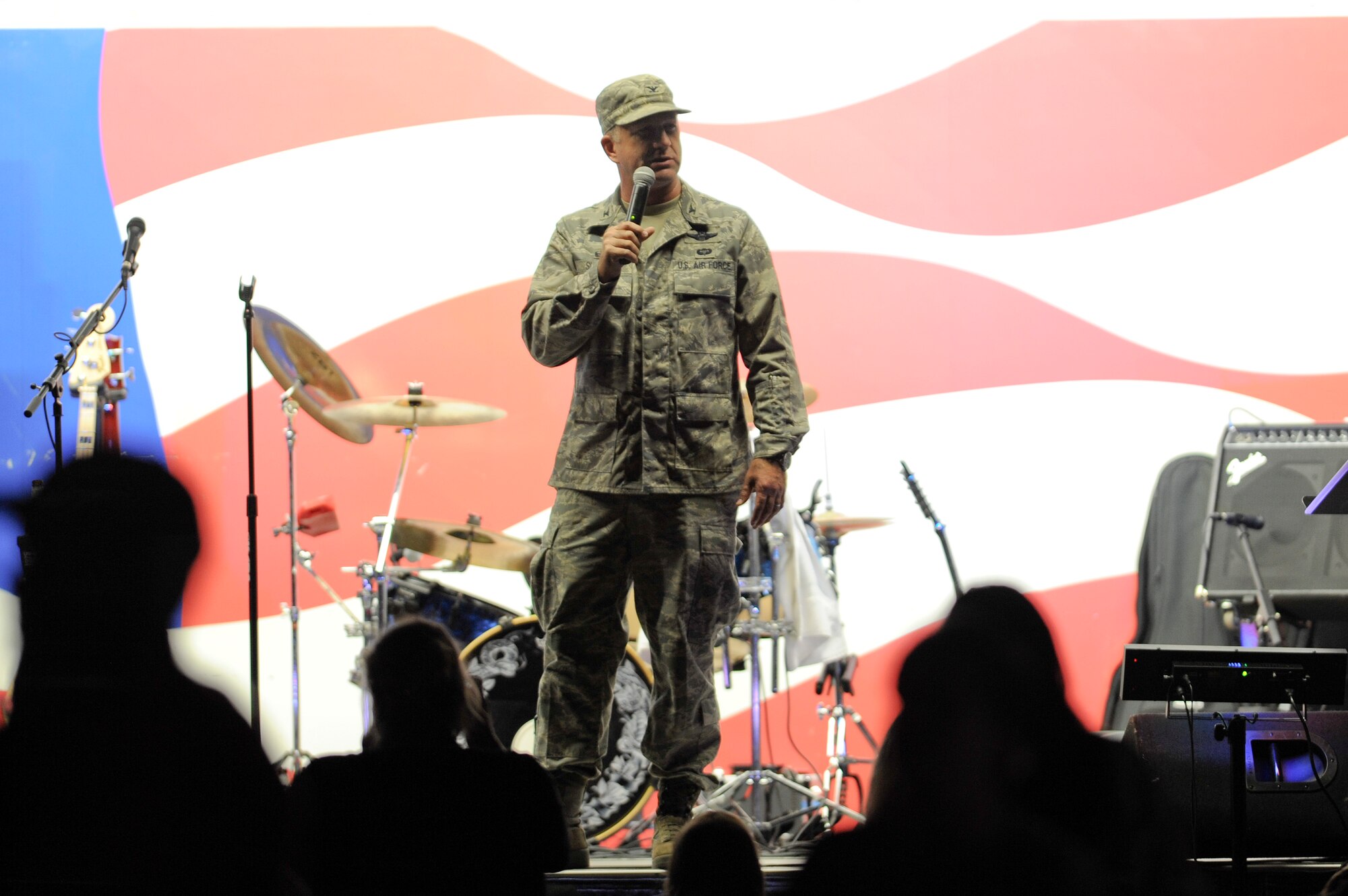 Col. Mark Slocum, 4th Fighter Wing commander, gives closing remarks during the Summer Time Blast on Aug. 15, 2014, at Seymour Johnson Air Force Base, North Carolina. The event featured fireworks, live music, food, and family games and entertainment. (U.S. Air Force photo/Airman 1st Class Aaron J. Jenne)