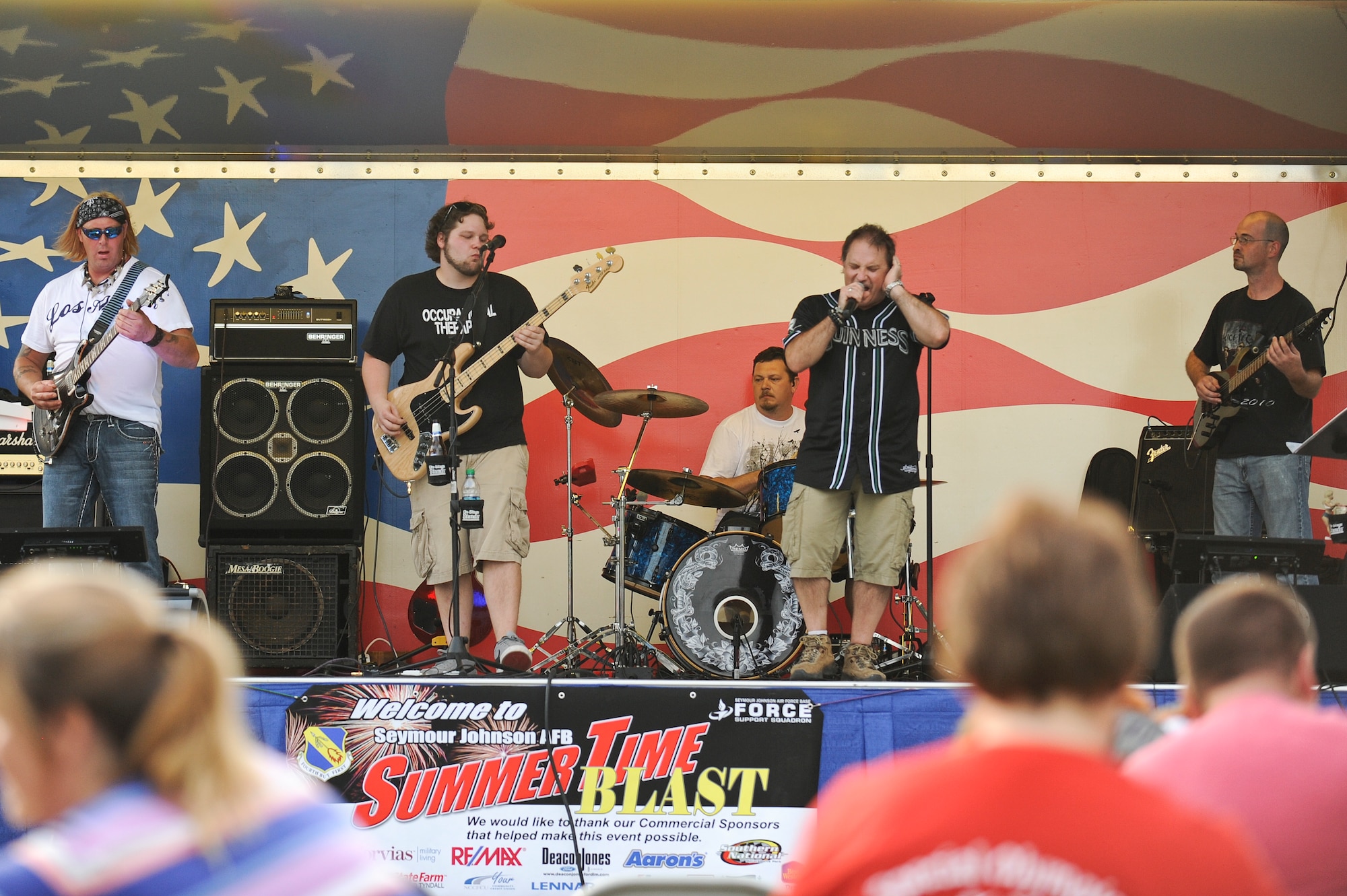 Queen Anne’s Revenge, a local band, performs live during the Summer Time Blast on Aug. 15, 2014, at Seymour Johnson Air Force Base, North Carolina. The event featured fireworks, live music, food, and family games and entertainment. (U.S. Air Force photo/Airman 1st Class Aaron J. Jenne)