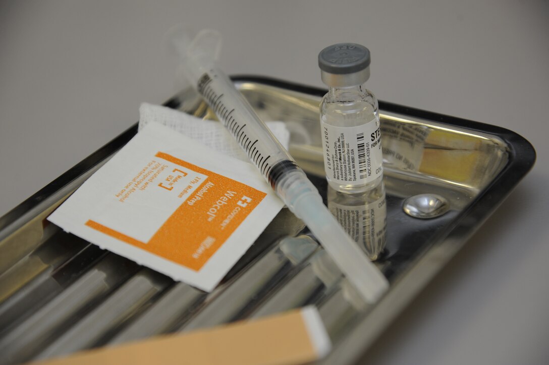 Supplies for a shot rest on a tray in the Laughlin Medical Clinic at Laughlin Air Force Base, Texas, Aug. 14, 2014. Parents are encouraged to bring their children to the clinic prior to the school year to ensure their children receive up to date vaccinations to prevent outbreaks like chickenpox. (U.S. Air Force photo by Airman 1st Class Jimmie D. Pike)