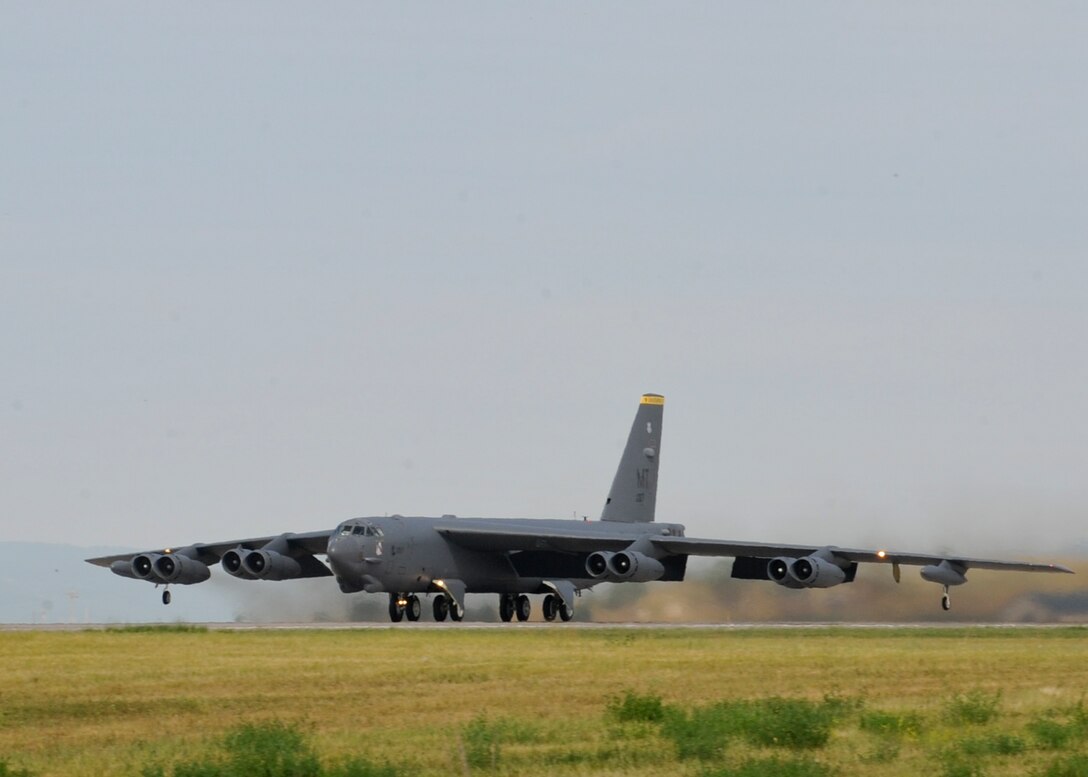 A B-52 Stratofortress from Minot Air Force Base, N.D., takes off during a standoff weapons integration training exercise at Ellsworth AFB, S.D., Aug. 14, 2014. The week-long training consists of B-52s and B-1s conducting simulated combat scenarios at the Powder River Training area to help prepare for real world contingencies. (U.S. Air Force photo by Senior Airman Anania Tekurio/Released)