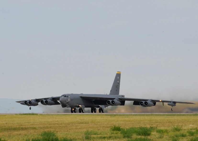 A B-52 Stratofortress from Minot Air Force Base, N.D., takes off during a standoff weapons integration training exercise at Ellsworth AFB, S.D., Aug. 14, 2014. The week-long training consists of B-52s and B-1s conducting simulated combat scenarios at the Powder River Training area to help prepare for real world contingencies. (U.S. Air Force photo by Senior Airman Anania Tekurio/Released)