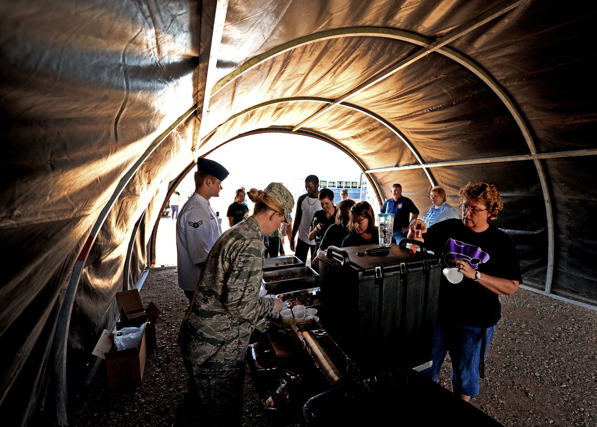 Educators from the local community sample various Meals Ready to Eat during the Teachers Understanding Deployment Operations event Aug. 12, 2014 at Cannon Air Force Base, N.M. An MRE contains up to 3,000 calories and members of the educational community were able to get a taste of what Airmen eat while deployed. (U.S. Air Force Photo/Airman 1st Class Chip Slack)
