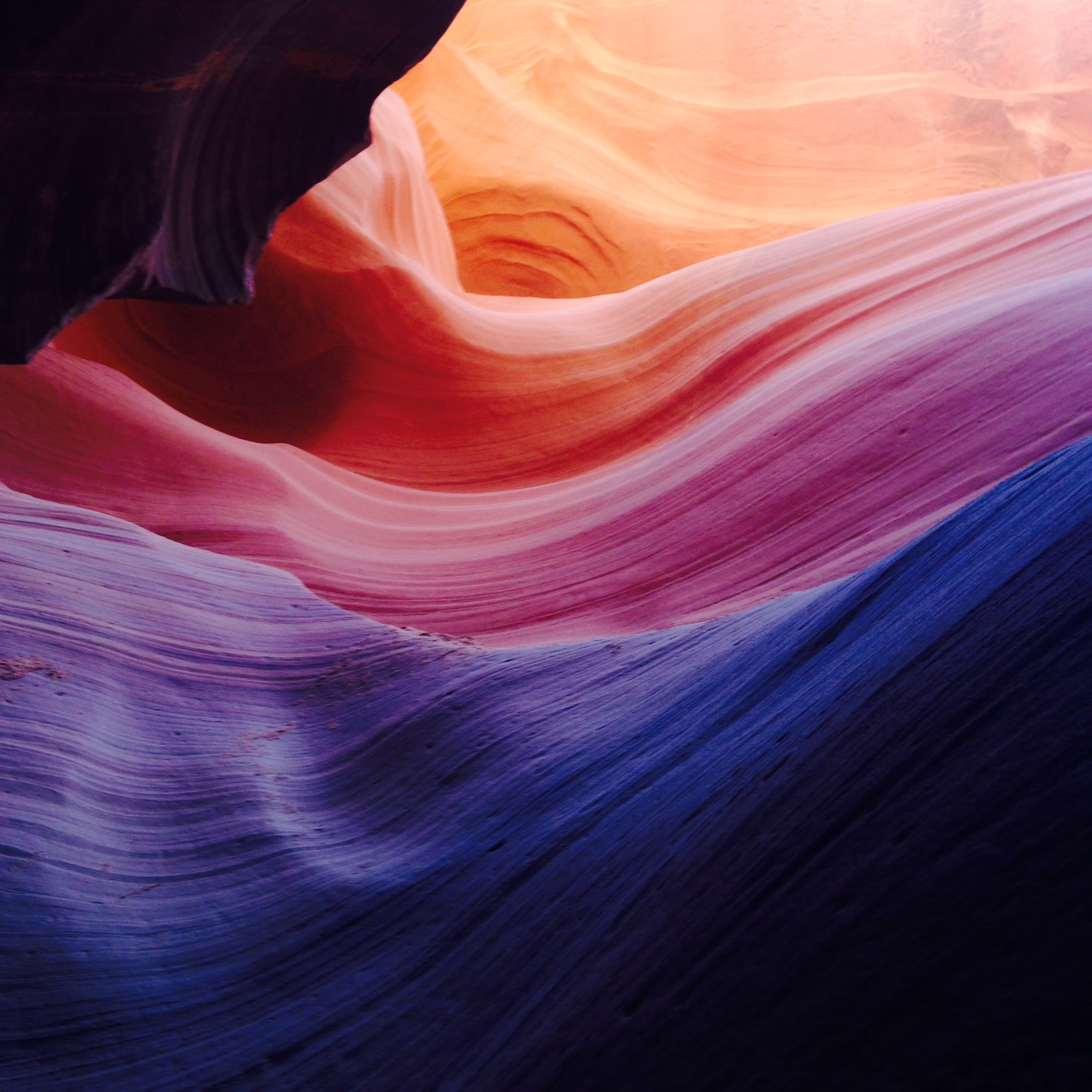 An upward view of the wall creates a rainbow effect. This photo was taken with the help of a canyon tour guide. (U.S. Air Force photo/Senior Airman Grace Lee)
