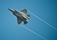 An F-35A Lightning II banks right while flying over the Duke Field runway Aug. 6.  The joint strike fighter landed at Duke for the first time moments later to participate in a joint base exercise.  (U.S. Air Force photo/Tech. Sgt. Sam King)