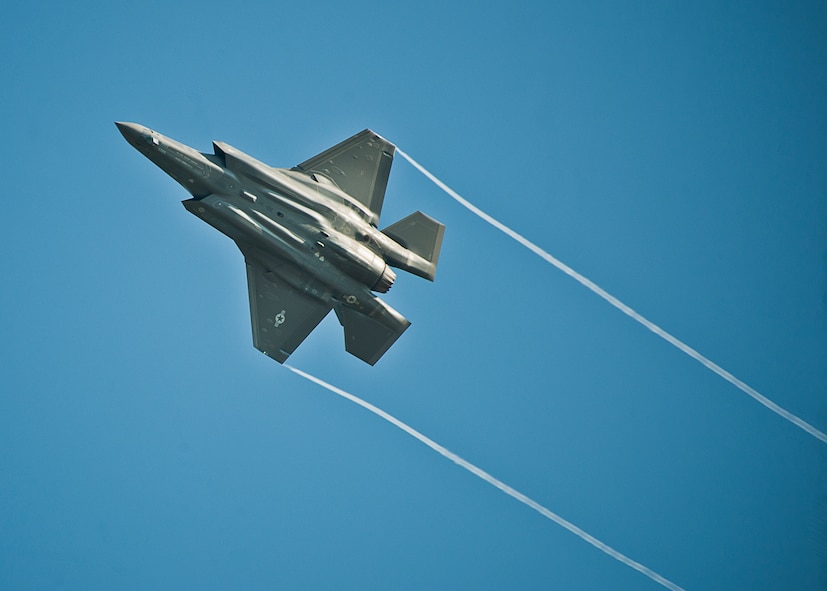 An F-35A Lightning II banks right while flying over the Duke Field runway Aug. 6.  The joint strike fighter landed at Duke for the first time moments later to participate in a joint base exercise.  (U.S. Air Force photo/Tech. Sgt. Sam King)