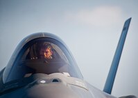 Capt. Elijah Supper, an F-35A Lightning II pilot with the 58th Fighter Squadron, powers down his aircraft after landing at Duke Field Aug. 6.  The joint strike fighter landed at Duke for the first time moments later to participate in a joint base exercise.  (U.S. Air Force photo/Tech. Sgt. Sam King)