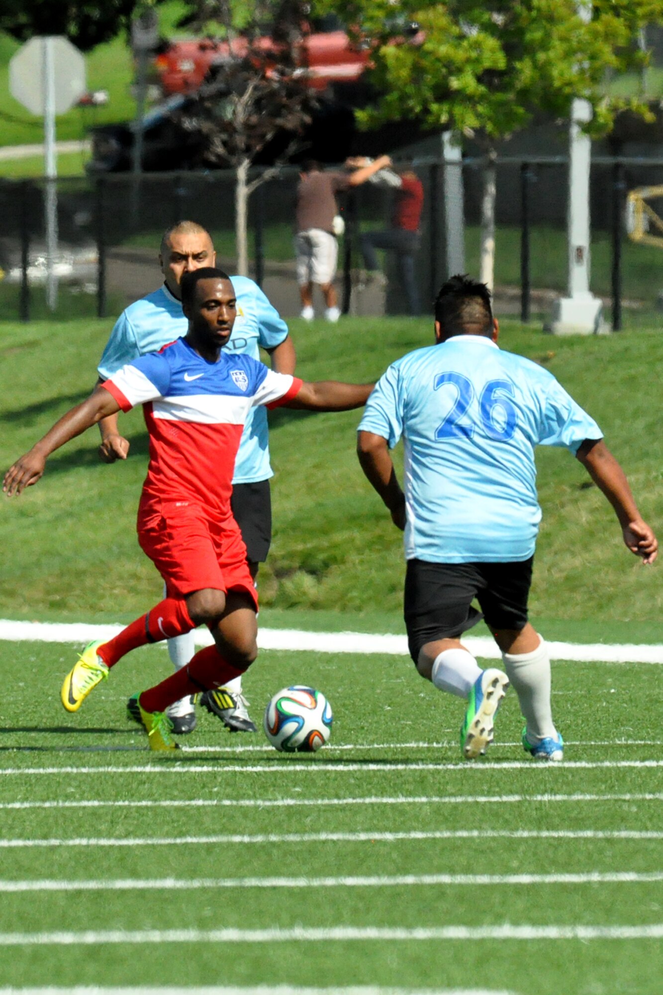 Nicholas Green, a midfielder with FC Offutt and U.S. Air Force senior airman with the 55th Force Support Squadron, makes a move against a player from FC Monterey at the Kroc Center in Omaha, Aug. 16. FC Offutt returns to San Antonio over Labor Day weekend to play in the Defenders Cup, an annual military soccer tournament, which they placed third in last year. (U.S. Air Force photo by Ryan Hansen/Released)