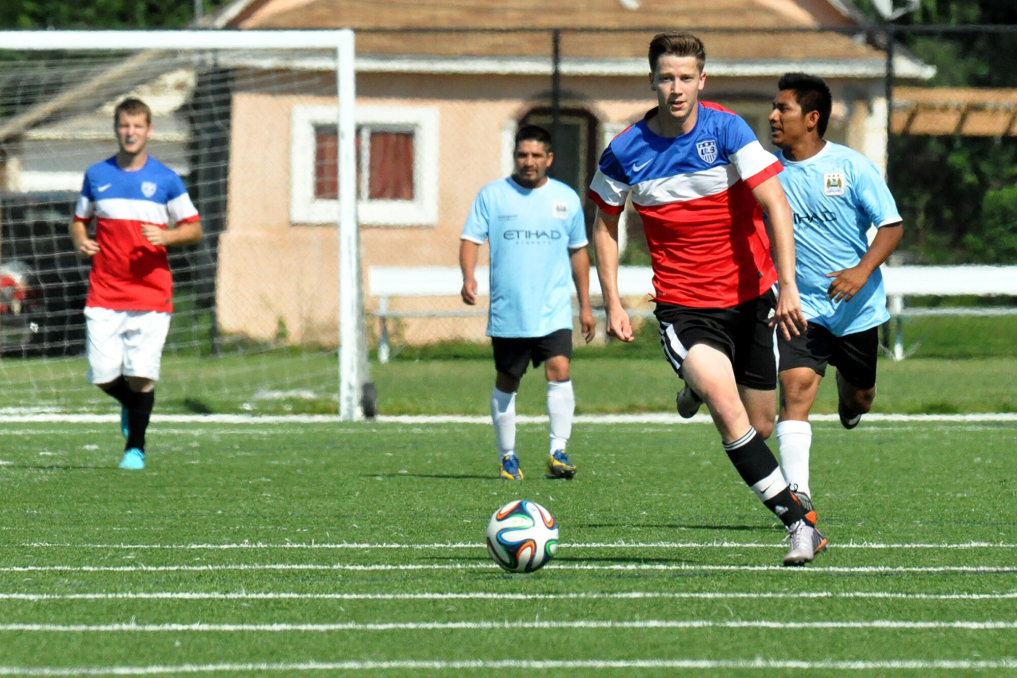 Dustin Wilson, a forward with FC Offutt and U.S. Air Force senior airman with the 55th Security Forces Squadron, breaks away in a game against FC Monterey at the Kroc Center in Omaha, Aug. 16. FC Offutt will be heading to San Antonio over Labor Day weekend for the third straight year to play in the Defenders Cup, an annual military soccer tournament. (U.S. Air Force photo by Ryan Hansen/Released)