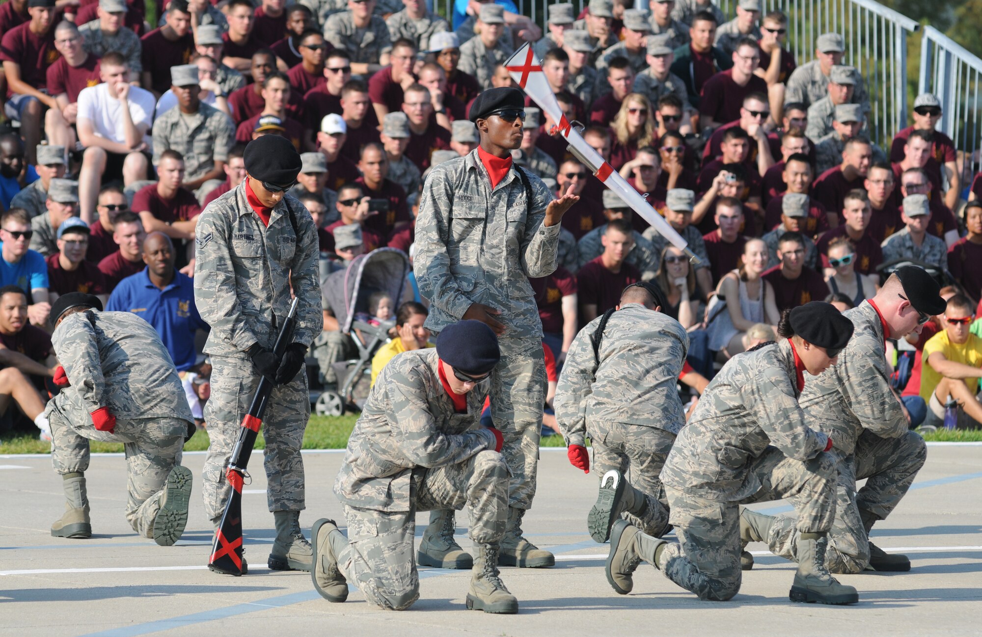 Airman 1st Class Tyleal Hodge, 336th Training Squadron, spins his rifle during the 81st Training Group’s drill down competition Aug. 15, 2014, behind the Levitow Training Support Facility at Keesler Air Force Base, Miss.  The 336th TRS “Red Wolves” placed 2nd in freestyle and overall.  (U.S. Air Force photo by Kemberly Groue)
