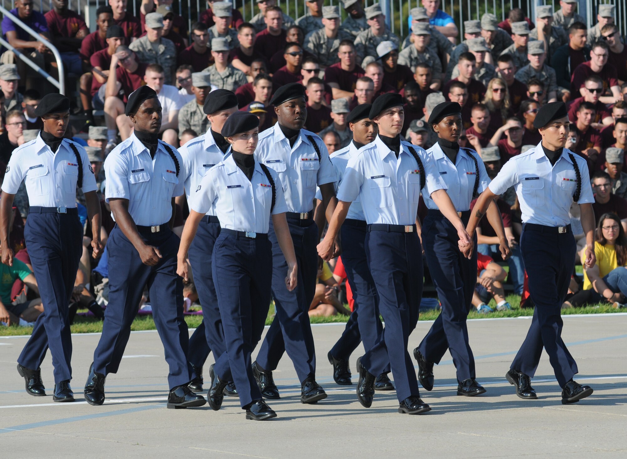 Members of the 335th Training Squadron freestyle drill team perform during the 81st Training Group’s drill down competition Aug. 15, 2014, behind the Levitow Training Support Facility at Keesler Air Force Base, Miss.  The 335th TRS “Bulls” placed third in freestyle and overall.  (U.S. Air Force photo by Kemberly Groue)
