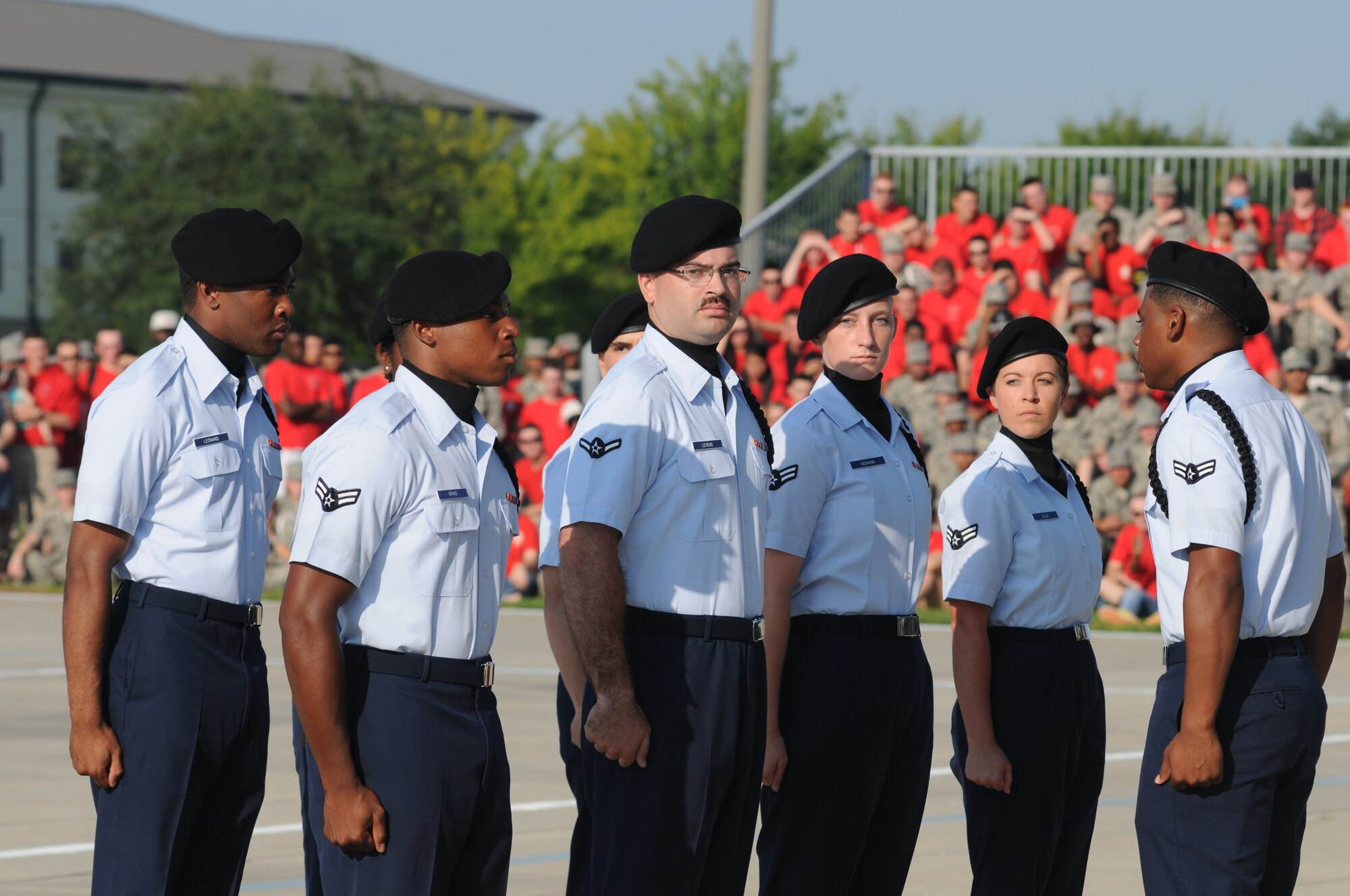 Members of the 334th Training Squadron regulation drill team performs during the 81st Training Group’s drill down competition Aug. 15, 2014, behind the Levitow Training Support Facility at Keesler Air Force Base, Miss.  (U.S. Air Force photo by Kemberly Groue)