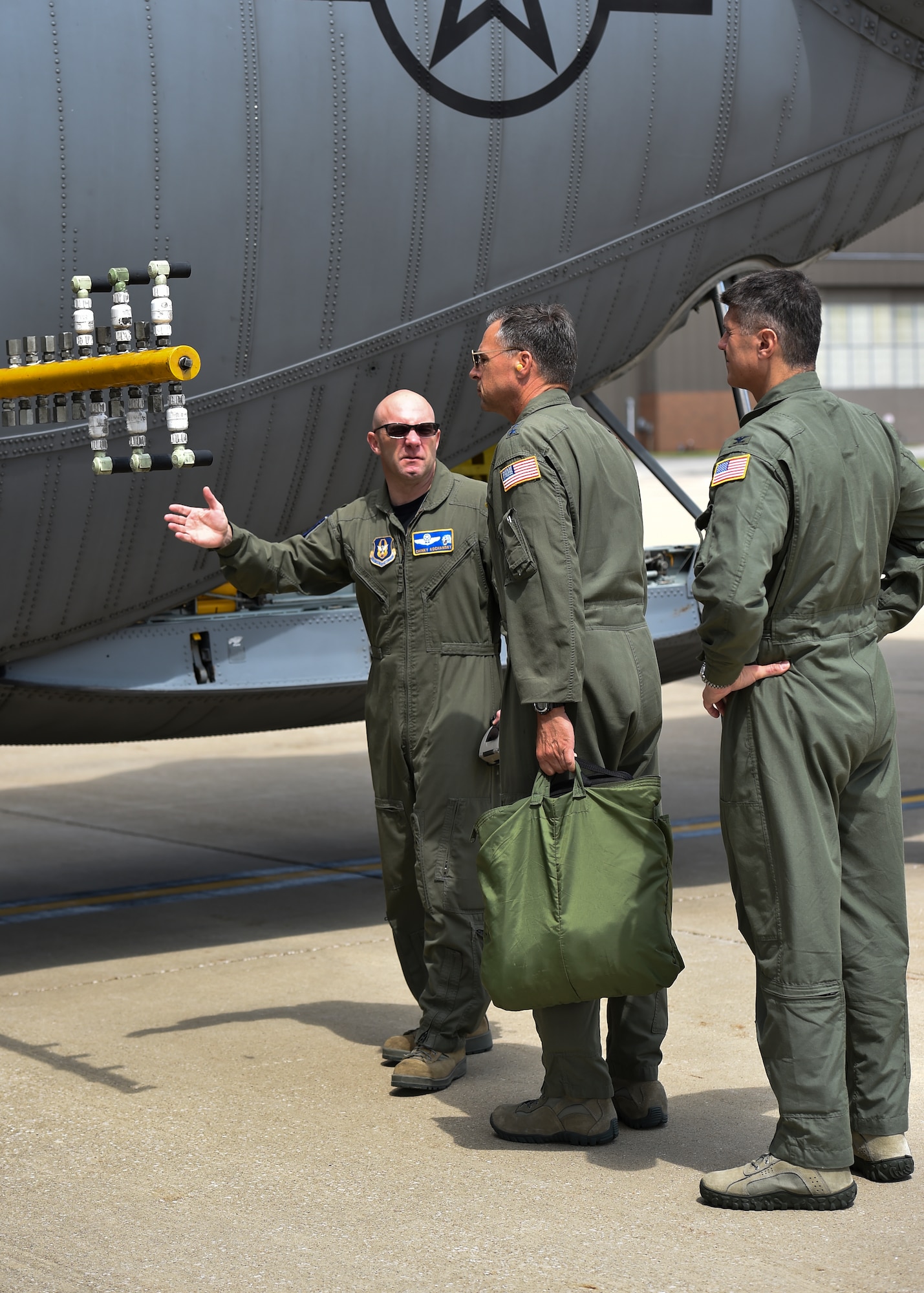 Lt. Col. John Kochansky, chief of aerial spray, shows the Modular Aerial Spray System boom arm to Maj. Gen. Scott M. Hanson, Director of Operations, Headquarters Air Mobility Command, Scott Air Force Base, Illinois, Aug. 15. Hanson visited YARS to become more familiar with the 910th Airlift Wing’s special aerial spray mission and see how Air Mobility Command can help the 910th and Air Force Reserve Command with their roles in bringing this mission to the Department of Defense (DoD). U.S. Air Force photo/Eric M. White.