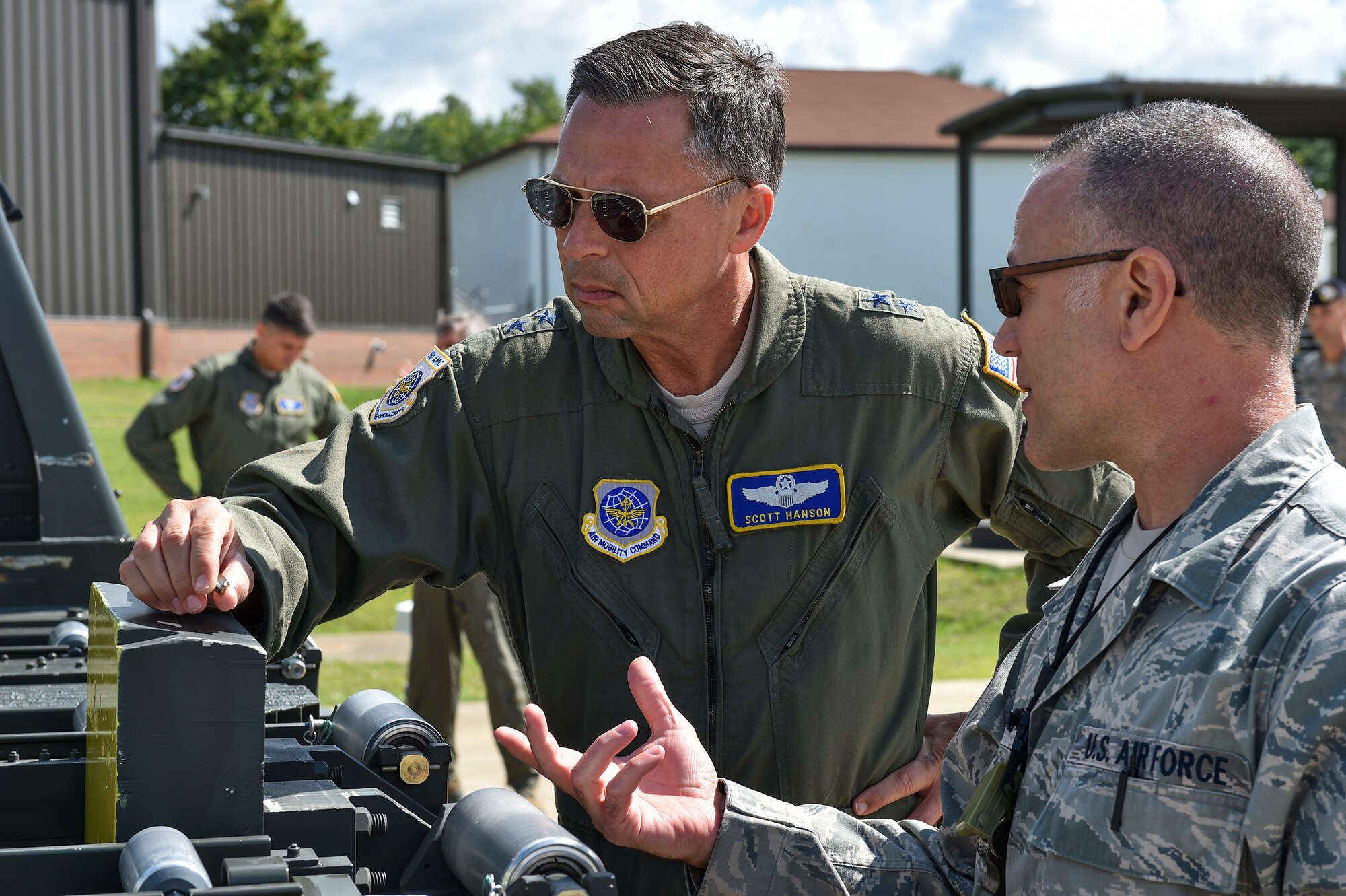 Senior Master Sgt. Phil Aliberti, aerial spray maintenance flight chief, shows spray nozzles from the Modular Aerial Spray System (MASS) to Maj. Gen. Scott M. Hanson, Director of Operations, Headquarters Air Mobility Command, Scott Air Force Base, Illinois, Aug. 15. Aerial spray maintainers use various nozzles for different applications of the aerial spray mission. Hanson visited YARS to become more familiar with the 910th Airlift Wing’s special aerial spray mission and see how Air Mobility Command can help the 910th and Air Force Reserve Command with their roles in bringing this mission to the Department of Defense (DoD). U.S. Air Force photo/Eric M. White.