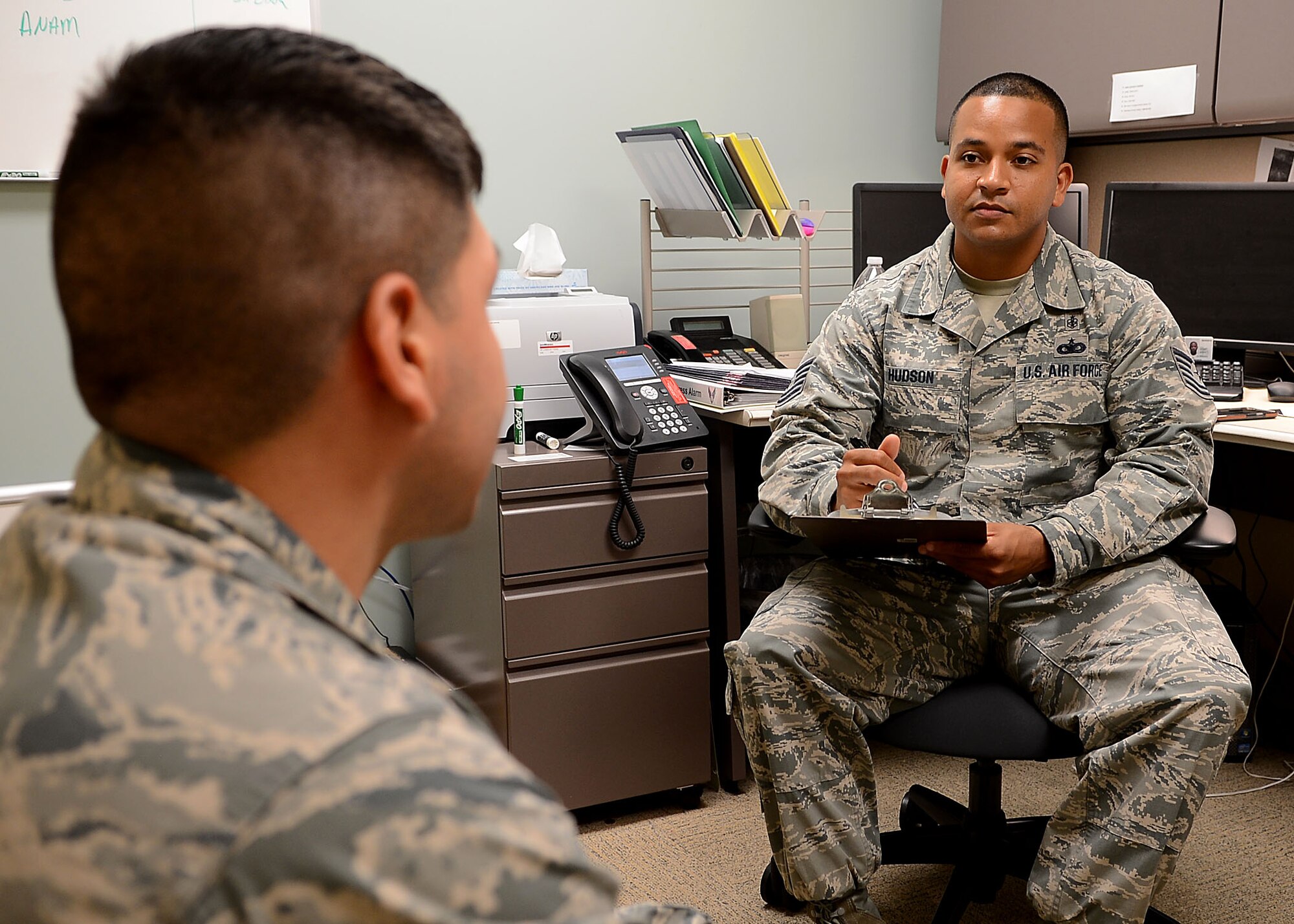 Tech. Sgt. Toyre Hudson, 6 Medical Operations Squadron mental health flight chief, listens to a patient at MacDill Air Force Base, Fla. Hudson has been named one of the 12 Outstanding Airman of the Year for 2014. (U.S. Air Force photo by Staff Sgt. Brittany Liddon/Released) 