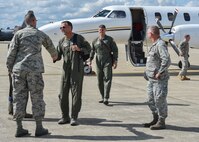 Col. Kevin Riley, 910th Mission Support Group commander, greets Maj. Gen. Scott M. Hanson, Director of Operations, Headquarters Air Mobility Command, Scott Air Force Base, Illinois, upon his arrival to Youngstown Air Reserve Station, Aug. 14. Hanson visited YARS to become more familiar with the 910th Airlift Wing’s special aerial spray mission and see how Air Mobility Command can help the 910th and Air Force Reserve Command with their roles in bringing this mission to the Department of Defense (DoD). U.S. Air Force photo/Eric M. White.