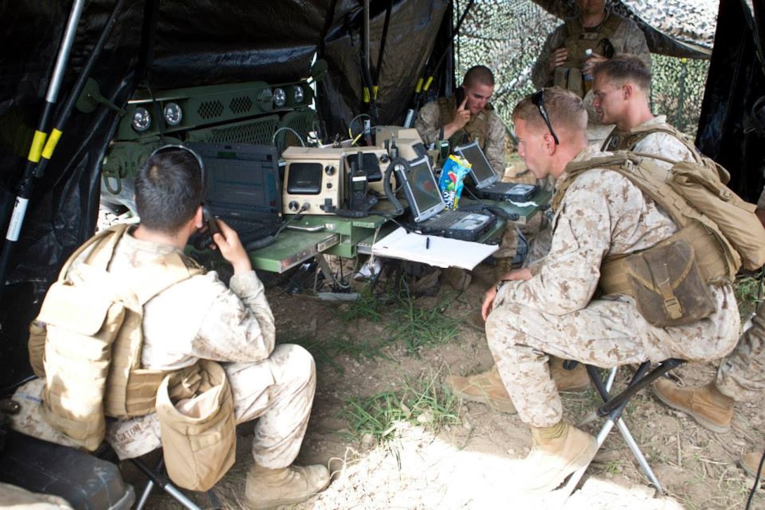 Marines use the MAGTF Enabler -Light (ME-L) as the Combat Operations Center for the Marine Corps Training Area Bellows (MCTAB) Company Landing Team (CLT) during the Advanced Warfighting Experiment in Hawaii.