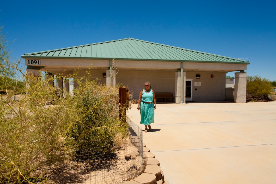 D'Anne Albers, a cultural resource specialist who has worked at the Combat Center Archaeology and Paleontology Curation Center since 2010, checks out one of the Ethnobotanical Gardens at the facility. (Official Marine Corps photo by Kelly O'Sullivan/Released)