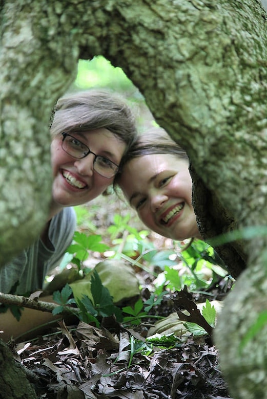 Shelby and Shannon of AmeriCorps’ Maple 1 team peek through the growth along Lake Shelbyville’s Chief Illini Trail in August 2014. Maple 1’s work over six weeks has rehabilitated 11 miles of hiking trail as part of the inaugural project for Making Trails Work.