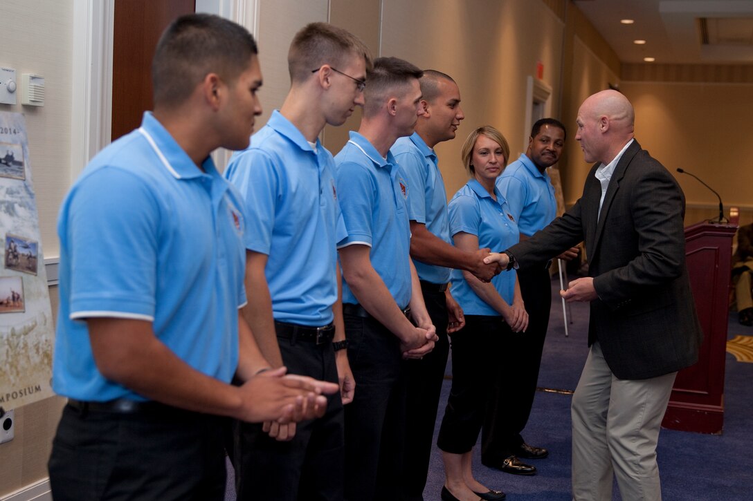 Sgt. Maj. Micheal P. Barrett, the 17th Sergeant Major of the Marine Corps, gives his closing remarks at the 2014 Sergeant Major of the Marine Corps Symposium in National Harbor Md., on Aug. 15, 2014. (U.S. Marine Corps photo by Lance Cpl. Samantha K. Draughon/ Released)
