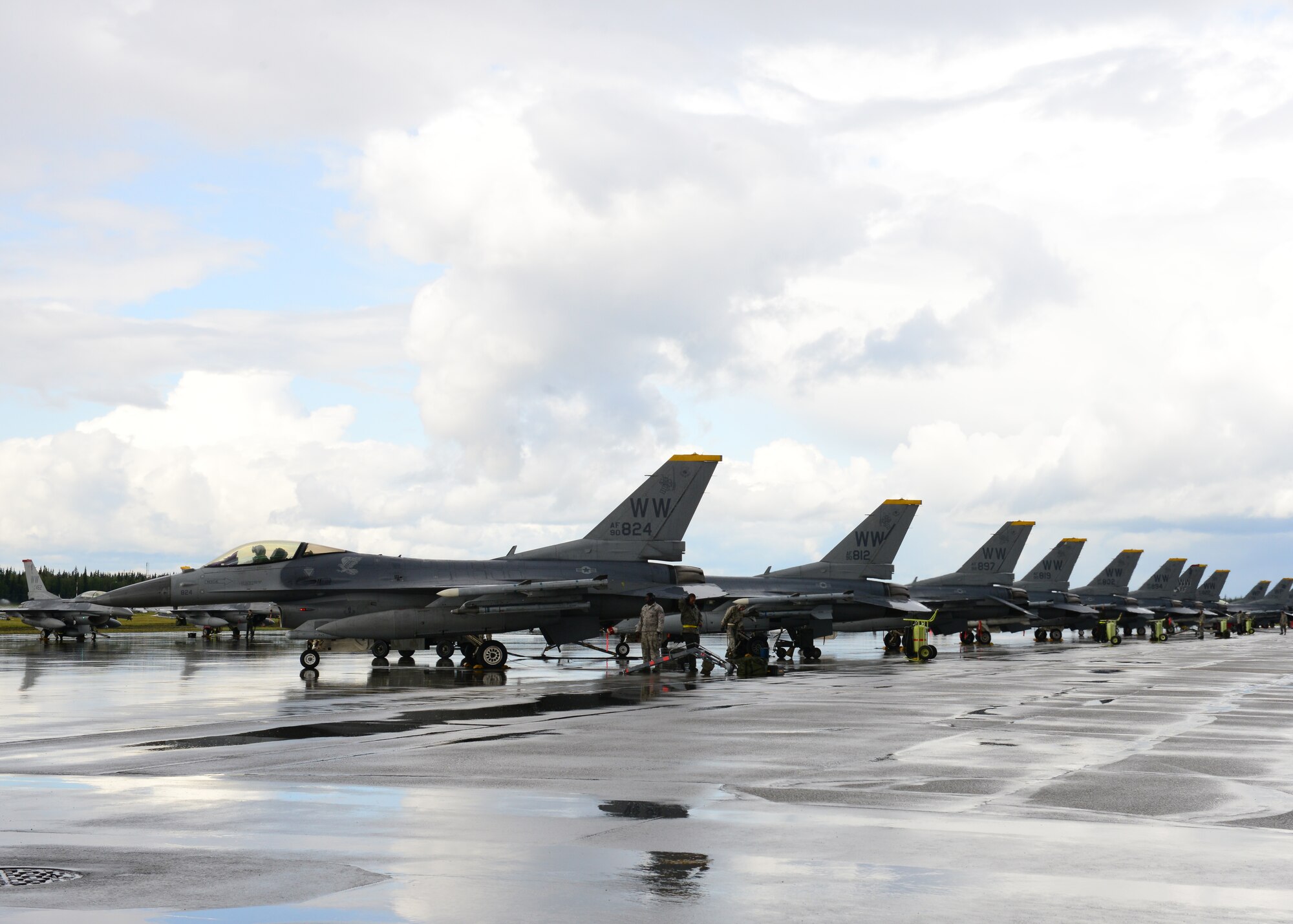 U.S. Air Force F-16 Fighting Falcons assigned to the 14th Fighter Squadron, Misawa Air Base, Japan, prepare for a sortie during RED FLAG-Alaska 14-3 Aug. 18, 2014, Eielson Air Force Base, Alaska. The 14th FS made their first RF-A appearance of the year, bringing tactical air combat skills to assist participating units. (U.S. Air Force photo by Senior Airman Ashley Nicole Taylor/Released)