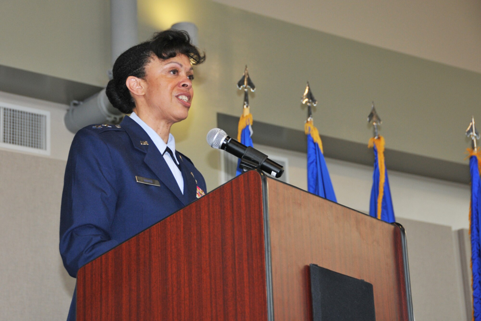 Stayce D. Harris, 22nd Air Force commander, gives remarks during promotion and assumption of command ceremonies, Aug. 9, 2014 at Dobbins Air Reserve Base, Ga. Harris will oversee 15,000 Reservists and 105 unit-equipped aircraft. She will have command supervision of the Reserve's air mobility operations and other vital mission sets. Reserve aircrews within 22nd Air Force fly a variety of missions to include aerial spraying, fire suppression, hurricane hunters to troop transport utilizing the C-130 Hercules. (U.S. Air Force photo/Staff Sgt. Jaclyn McDonald)