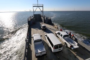 U.S. Army Vessel Hobkirk assigned to the 7th Transportation Brigade (Expeditionary), travels along the James River loaded with Joint Task Force Civil Support vehicles during a Joint Logistics Over-the-Shore exercise in Newport News, Va., Aug. 14, 2014. The 174-foot-vessel traveled four-and-a-half-hours to Joint Expeditionary Base Little Creek-Fort Story, Va. (Department of Defense photo by U.S. Navy Petty Officer 1st Class Brian Dietrick/Released)