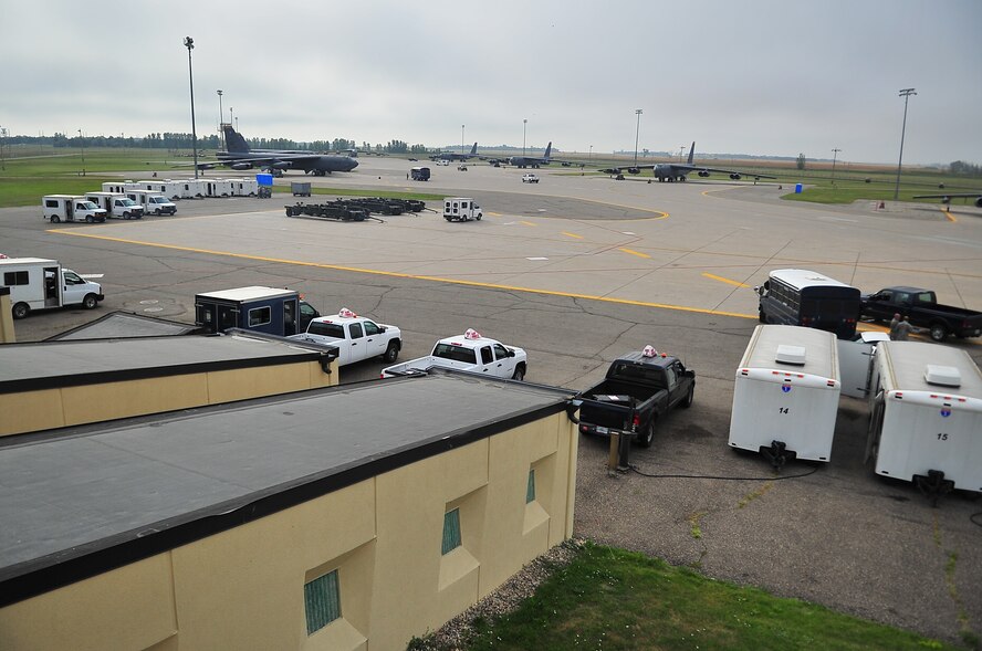 B-52H Stratofortresses sits in the alternate parking area during a minimum-interval takeoff exercise on Minot Air Force Base, N.D., Aug. 15, 2014. The 5th Bomb Wing routinely conducts training operations and exercises to ensure its forces can perform their mission at any time. (U.S. Air Force photo/Senior Airman Brittany Y. Bateman) 