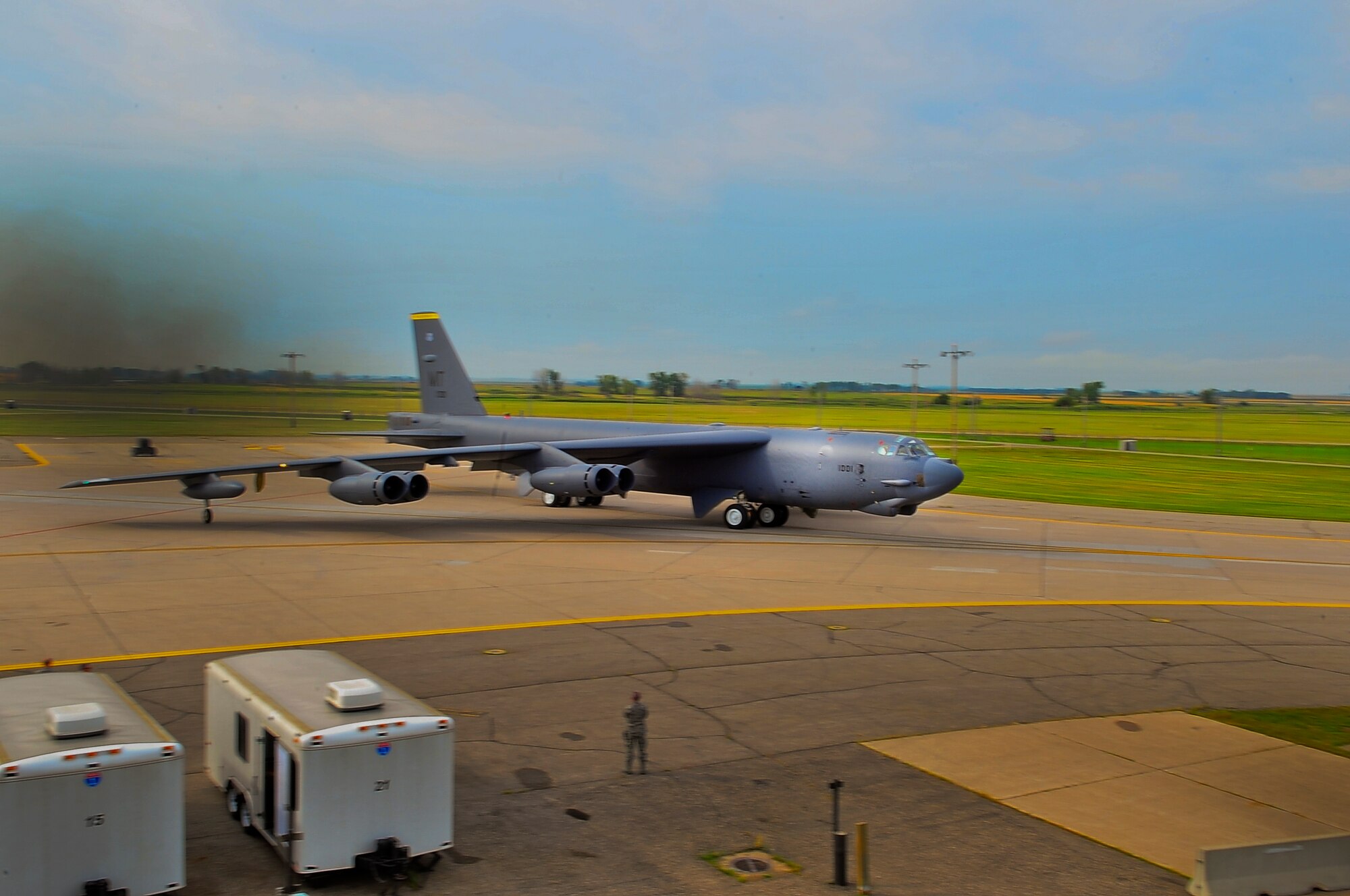 A B-52H Stratofortress taxis down the taxi-way during a minimum-interval takeoff exercise on Minot Air Force Base, N.D., Aug. 15, 2014. The 5th Bomb Wing routinely conducts training operations and exercises to ensure its forces can perform their mission at any time. (U.S. Air Force photo/Senior Airman Brittany Y. Bateman) 