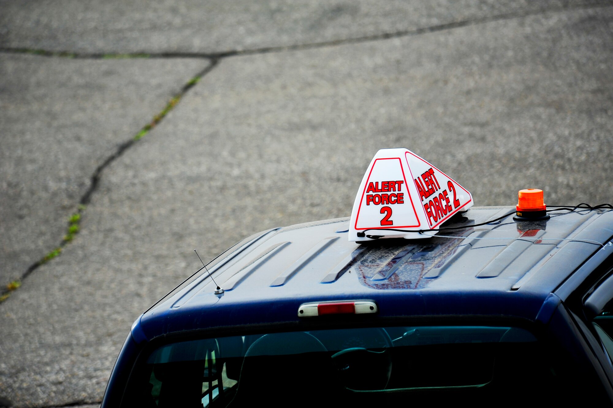 An alert vehicle sits in the alternate parking area during a minimum-interval takeoff exercise on Minot Air Force Base, N.D., Aug. 15, 2014. Exercises like these are integral to maintaining mission readiness. (U.S. Air Force photo/Senior Airman Brittany Y. Bateman) 