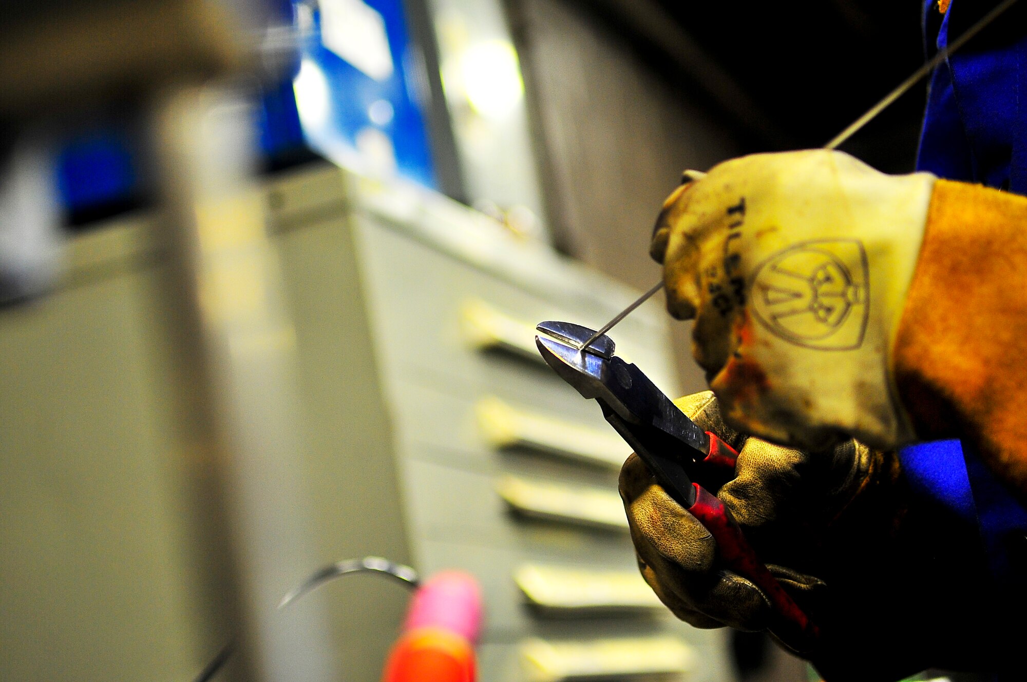 Senior Airman Matthew Vley, 5th Maintenance Squadron metals technician, prepares his equipment on Minot Air Force Base, N.D., Aug. 7, 2014. Vley is performing a task for his welding certifications. (U.S. Air Force photo/Senior Airman Brittany Y. Bateman)