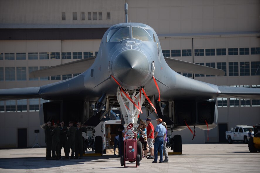 Airmen, families, and community members tour a B-1 bomber static on the flightline during Ellsworth’s Black Hills Community Appreciation Day at Ellsworth Air Force Base, S.D., Aug. 16, 2014. The event highlighted the base’s mission while increasing the community’s overall understanding of the Air Force lifestyle. (U.S. Air Force photo by Senior Airman Zachary Hada/Released)