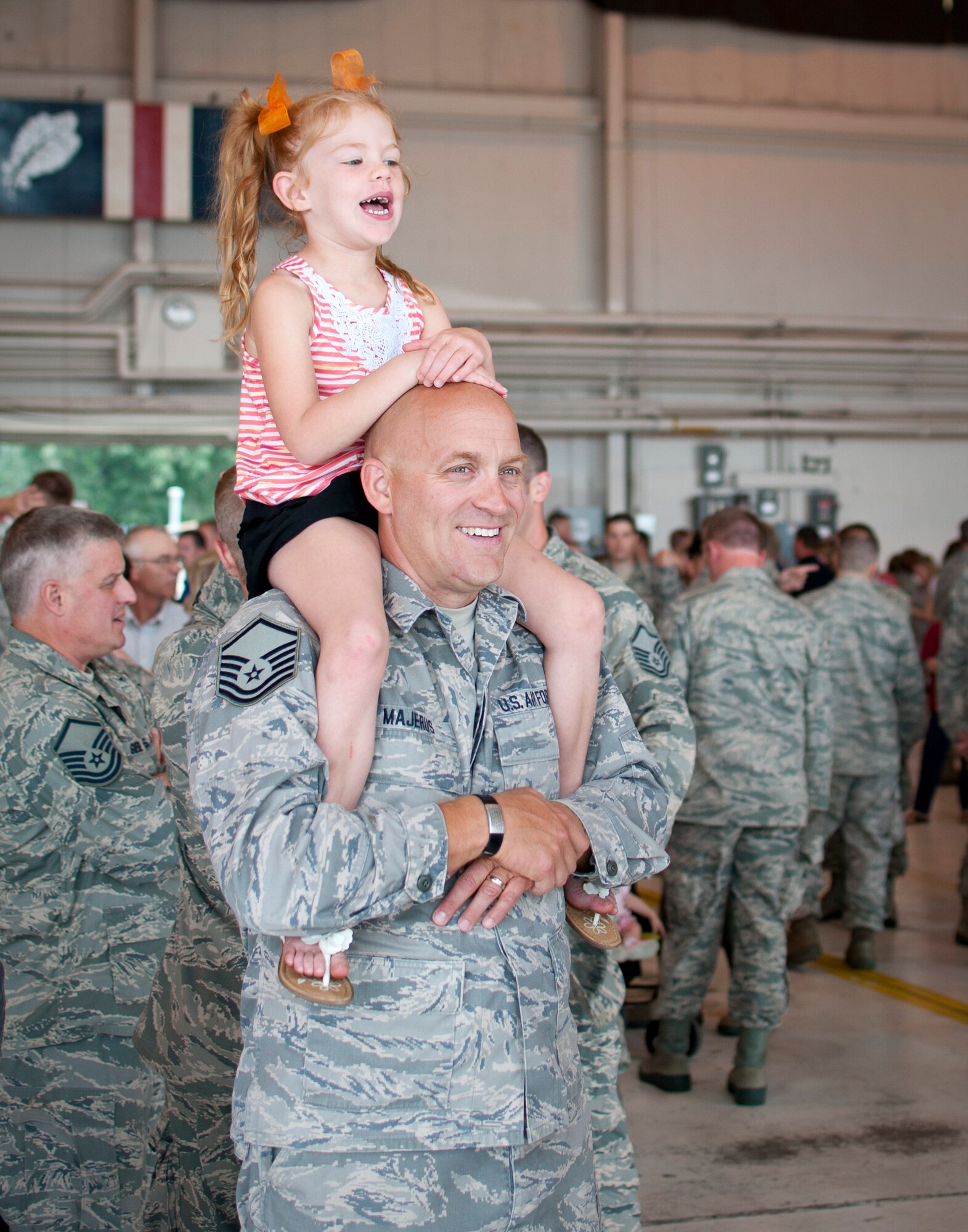 U.S. Air Force Airmen from the 133rd Airlift Wing and their families take part in Family Day activities in St. Paul, Minn., Aug. 16, 2014. Family Day is an annual event that recognizes the families and thanks them for their support to the Airmen.
(U.S. Air National Guard photo by Staff. Sgt. Austen Adriaens/Released)
