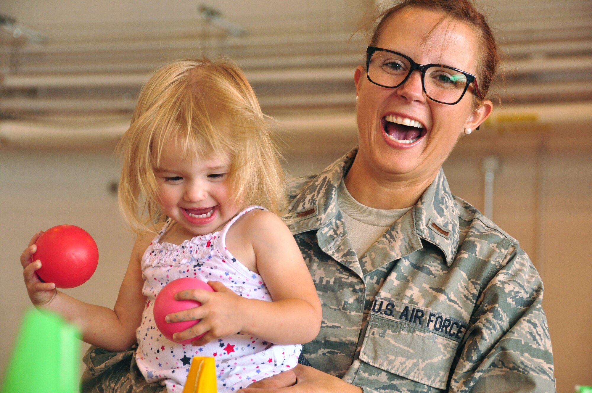 U.S. Air Force Airmen of the 133rd Airlift Wing and their families participate in Family Day activities in St. Paul, Minn., Aug. 16, 2014. Family Day is an event that recognizes the sacrifice and dedication of family members of the 133rd Airlift Wing. (U.S. Air National Guard photo by Senior Master Sgt. Jason Rolfe /Released)