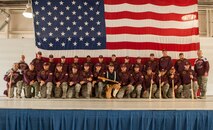 Members of the 91st Missile Wing Global Strike Challenge team pose for a photo during the kick-off party on Minot Air Force Base, N.D., Aug. 15, 2014. Global Strike Challenge events provide teams the opportunity to improve their knowledge, readiness and effectiveness through intense preparation and spirited competition. (U.S. Air Force photo/Airman 1st Class Apryl Hall)