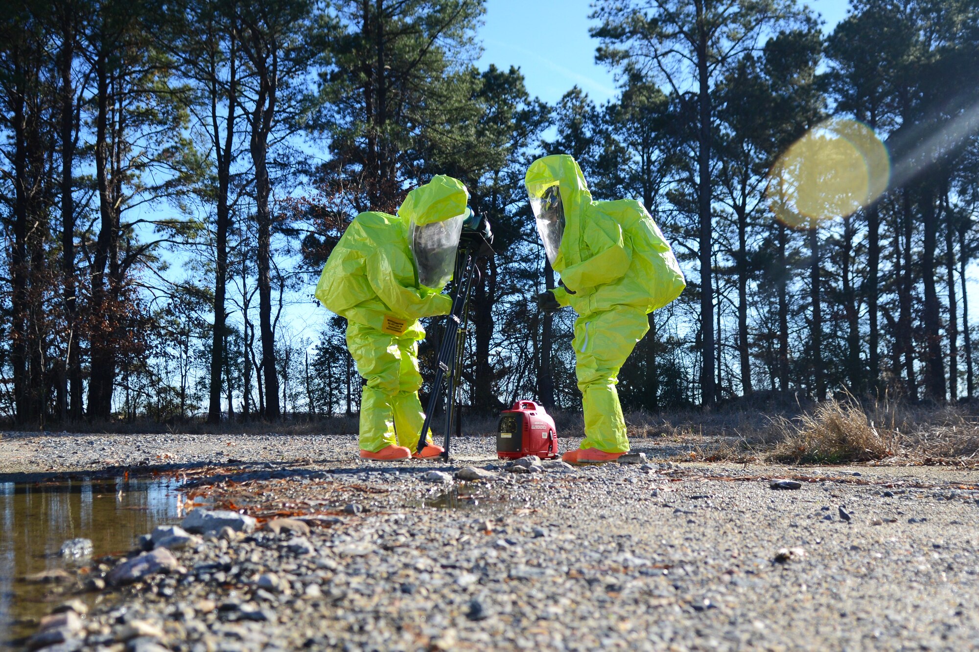 From left, U.S. Air Force Staff Sgt. Shamikah Dunnings and Senior Airman Sarah Lowry, 633rd Aerospace Medicine Squadron bio-environmental engineer technicians, assemble a Radeco air sampling instrument and portable generator during an active shooter exercise at Langley Air Force Base, Va., Dec. 19, 2013. Women have filled several key roles in U.S. military history dating back to the American Revolution when they served as battlefield nurses, water bearers and cooks. Today, women serve in nearly every career field in the U.S. Armed Forces and, although women already fill certain combat positions, they are on the forefront of having the ability to serve in all combat professions by 2016. Dunnings hails from Chicago, and Lowry is a native of Derby, Kan. (U.S. Air Force photo by Senior Airman Jason J. Brown/Released)