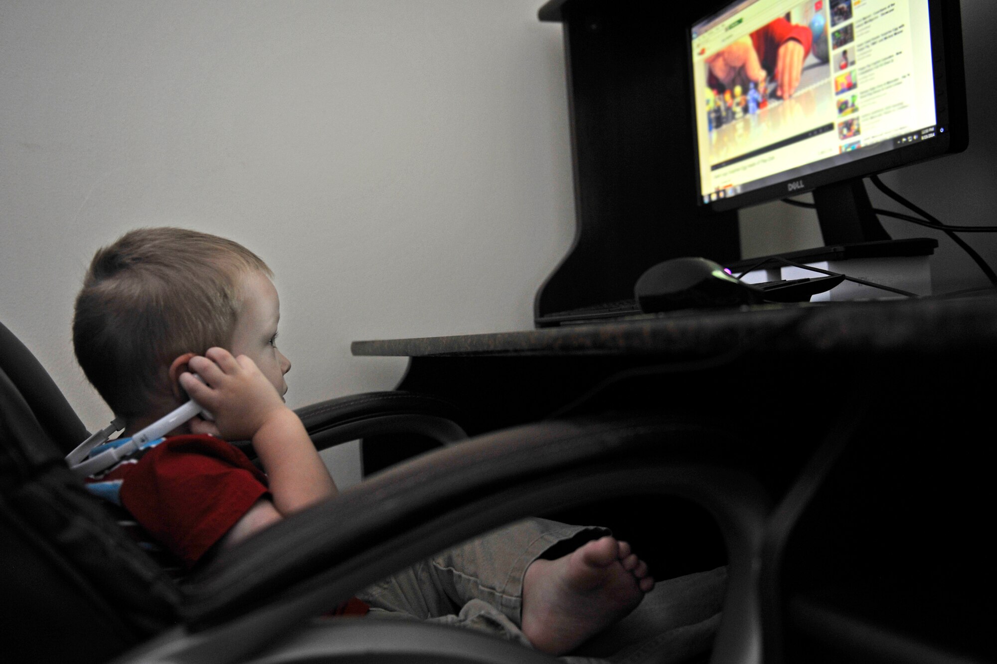 Liam Konczak, 2, uses the family computer on occasion, under the careful supervision of his dad, Mike. How early is too early for parents to consider cyberbullying and what to do if their child is in such a situation? Parents can find resources to help with this adversity their children may face, before it happens. Online bullies become more commonplace when a child has access to technology such as a computer or cell phone. Specialists suggest open communication between child and parent is paramount to identifying when their child may be the victim of cyberbullying. (U.S. Air Force photo by Airman 1st Class Erica Crossen)