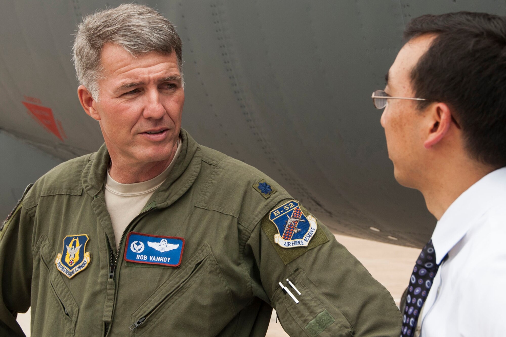 U.S. Air Force Lt. Col. Robert VanHoy, 93rd Bomb Squadron commander, speaks with a member of the Nuclear Command and Control Support Staff during a visit to Barksdale Air Force Base, La., Aug. 18, 2014. (U.S. Air Force photo by Master Sgt. Jeff Walston/Released)    
