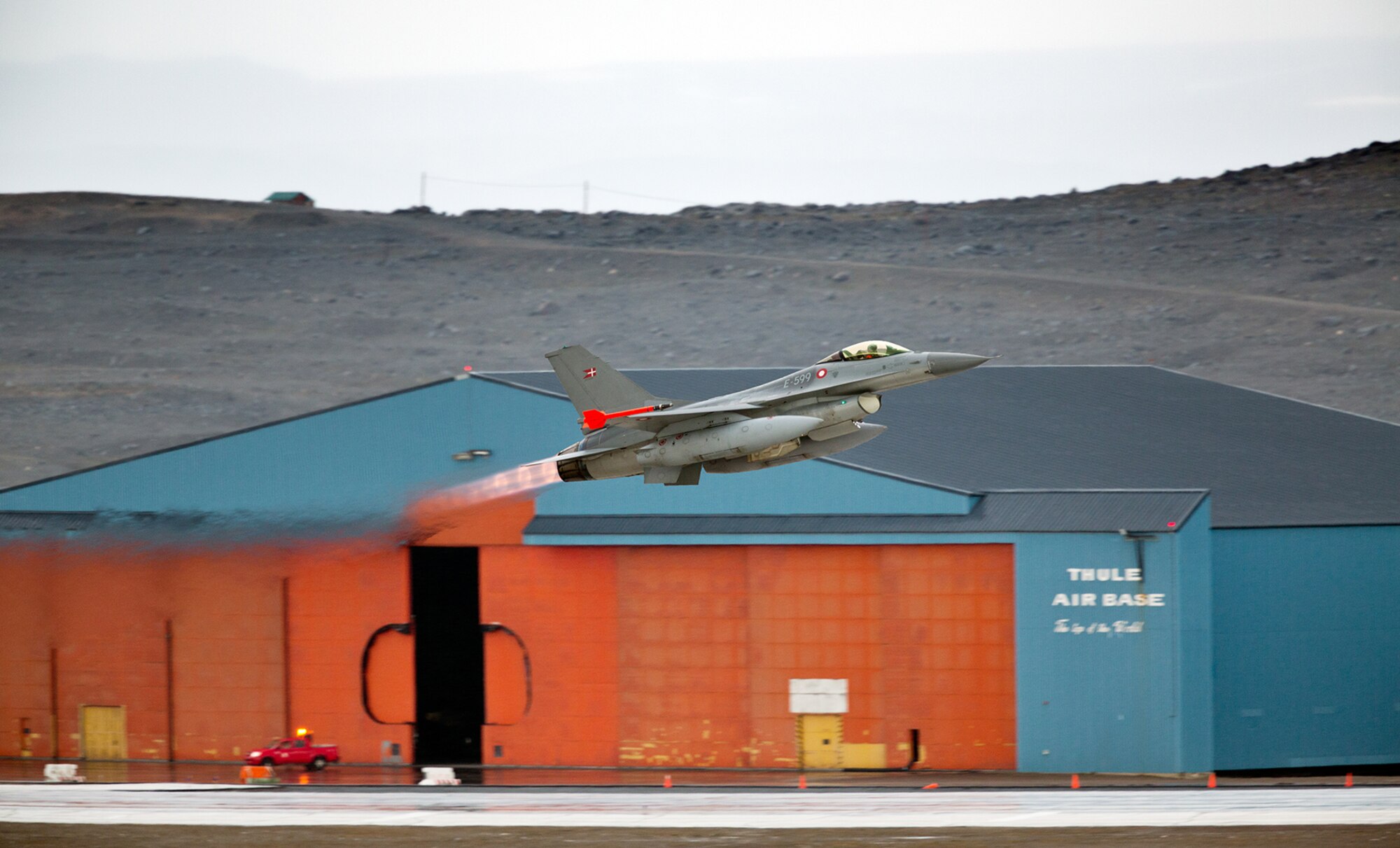 THULE AIR BASE, Greenland – A Danish F-16 takes off Aug. 6 at Thule Air Base. The F-16 flight was part of a capability test for search and rescue missions over Greenland, and to define logistical requirements for potential future F-16 operations. (Photo courtesy/Walther Toft)