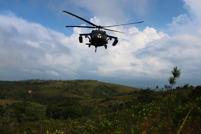 The 1-228th Aviation Regiment evacuated a Honduran Presidential Honor Guard service member from the island of Roatan to a Tegucigalpa hospital Aug. 16, 2014 after sustaining life-threatening injuries the previous night.  The Honduran Air Force commanding general requested the air medical evacuation of the patient who received head and neck injuries when he was ran over by a vehicle on Friday night.  (Courtesy Photo)